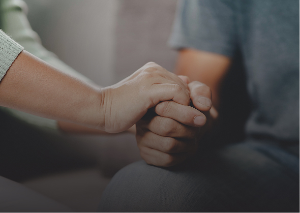 someone holding another person's hand